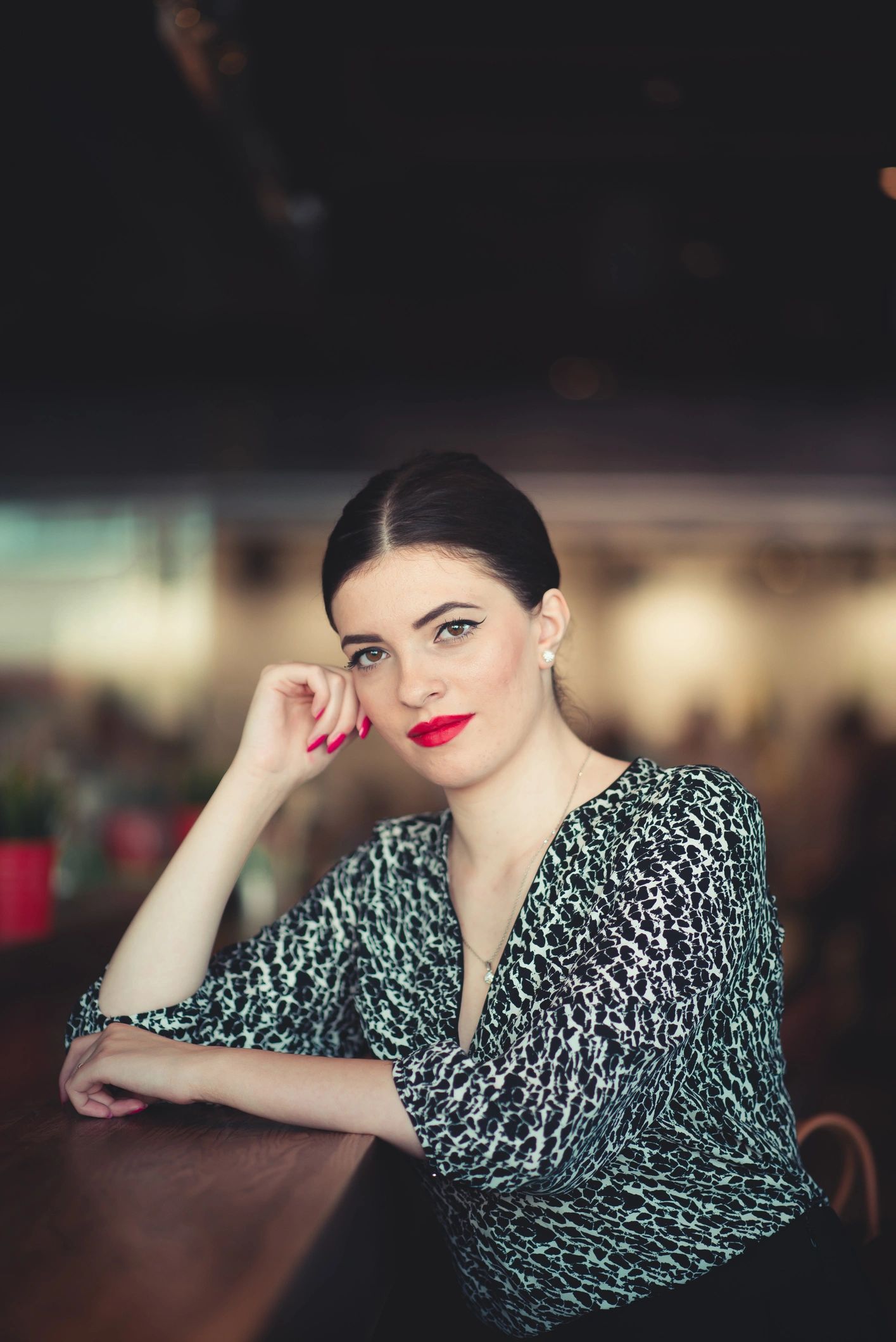 Guest enjoying time at a café table
