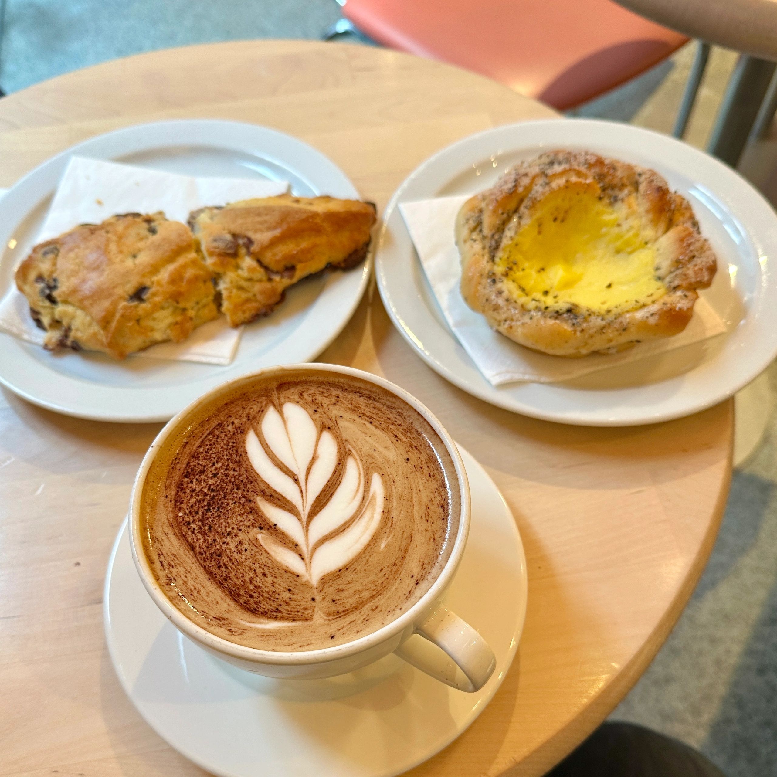 Latte served with pastries